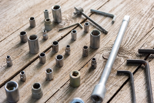 Photo hex keys for repair on a wooden table.