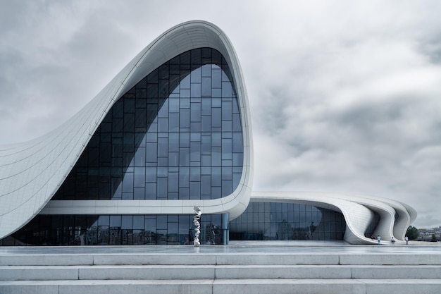 Heydar Aliyev Center building with curved lines by architect Zaha Hadid in daylight Baku Azerbaijan