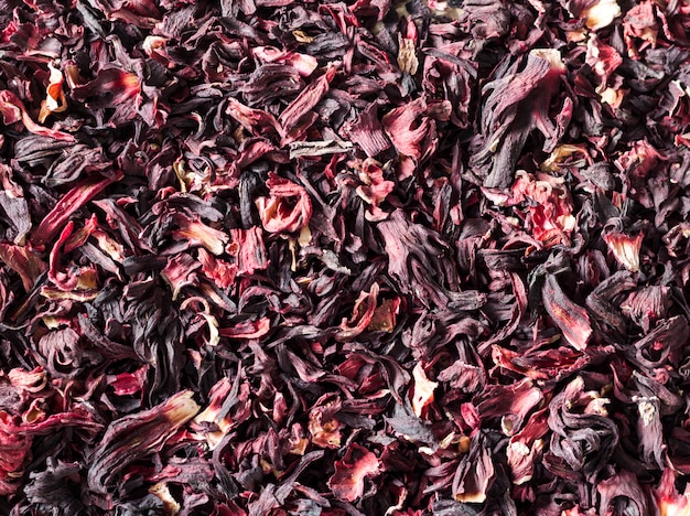 Hibiscus tea background, closeup. flat lay, top view.