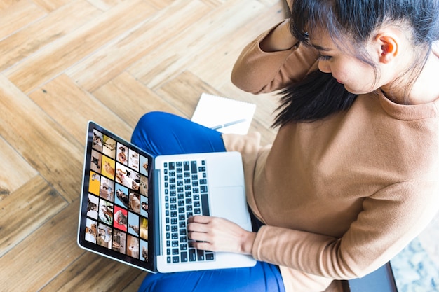 Photo high angle adult searching for stock images