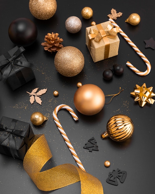 high angle of christmas ornaments with gifts
