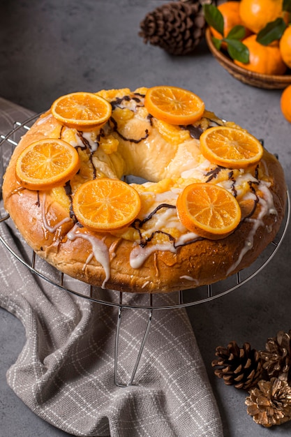 High angle delicious epiphany day cake with sliced oranges