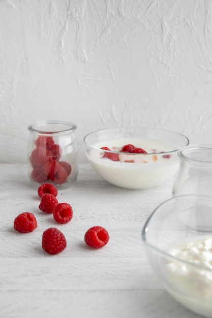 High angle delicious yogurt and raspberries