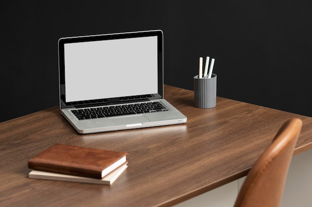 High angle desk assortment with laptop