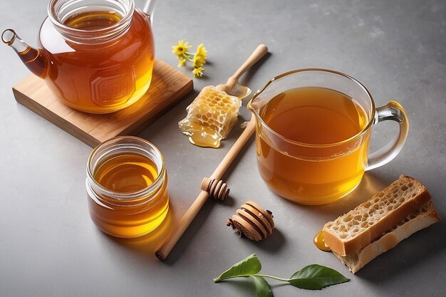 High angle glass with teapot and honey jar