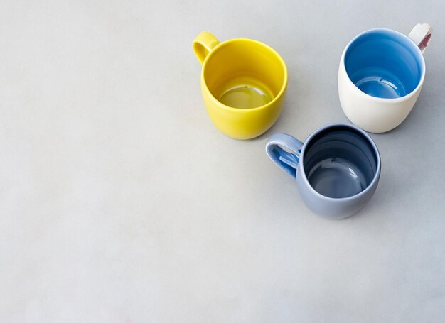 high angle painted mugs arrangement