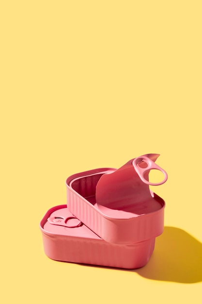 High angle pink tin can with copy-space