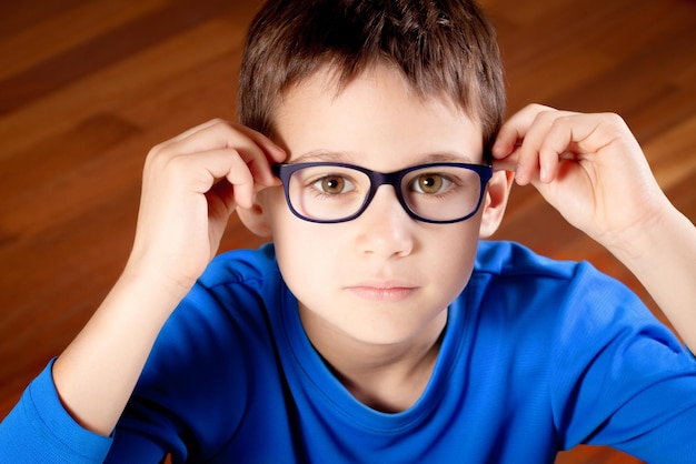 high angle portrait of boy wearing eyeglasses