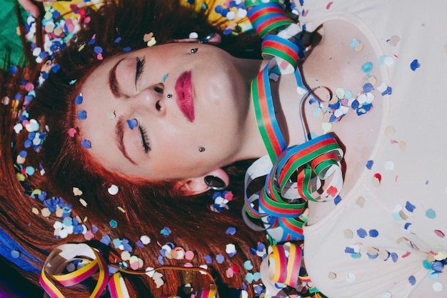 High angle portrait of young woman lying down