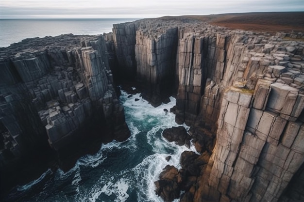 High angle shot of the beautiful rocky cliffs over the ocean photography