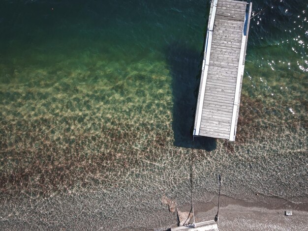 High angle shot of a dock by the sea