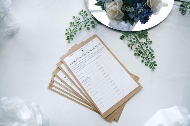 High angle shot of funny wedding guest mad libs as decorations