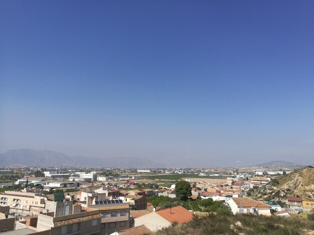 Photo high angle shot of townscape against clear blue sky