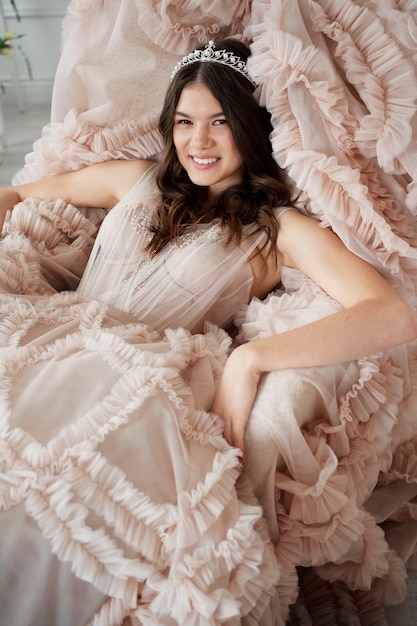 High angle smiley girl with glamorous dress