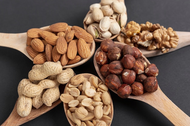 High angle of spoon with assortment of nuts