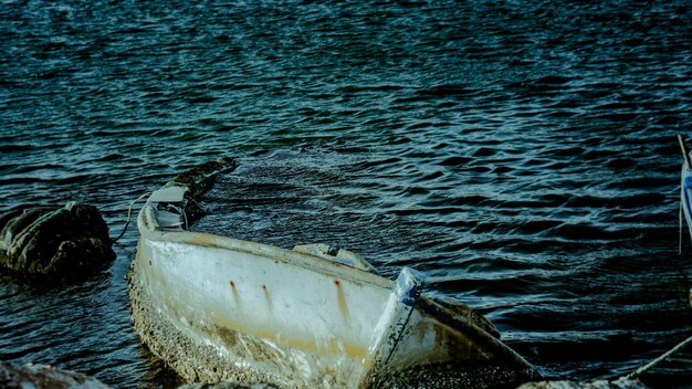 High angle view of abandoned boat in sea