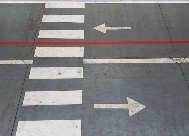 High angle view of arrow sign on road