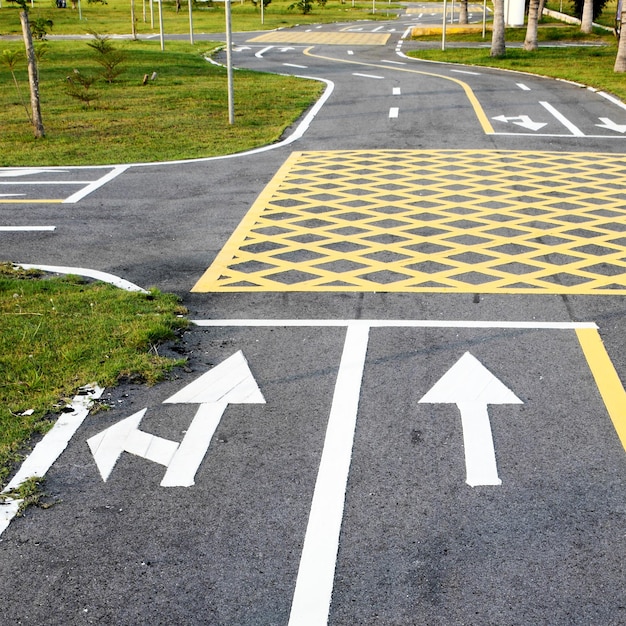 High angle view of arrow sign on road