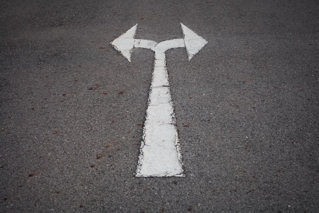 high angle view of arrow symbol on road