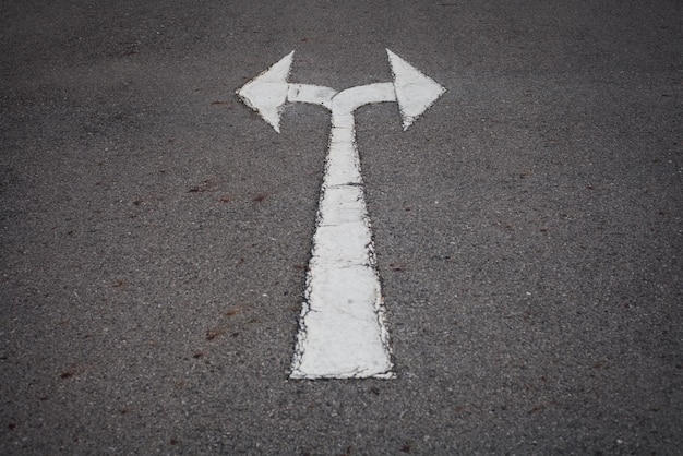 High angle view of arrow symbol on road