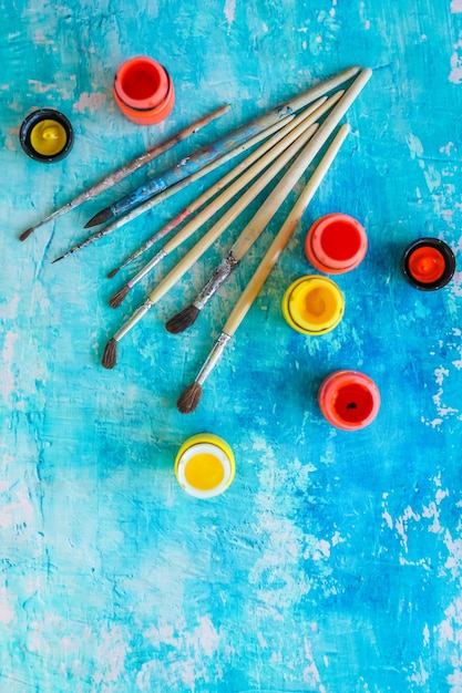 High angle view of art and craft equipment on table