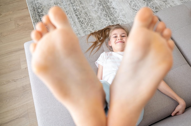 High angle view of baby lying on bed at home