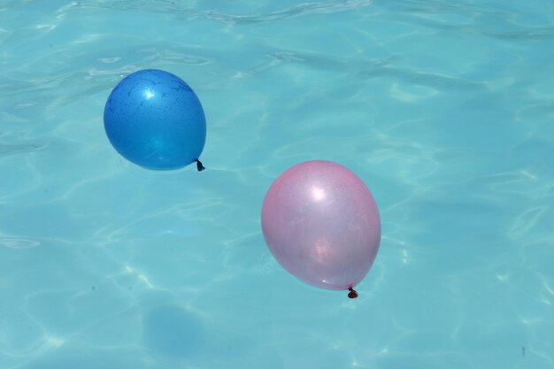 High angle view of balloons floating on swimming pool