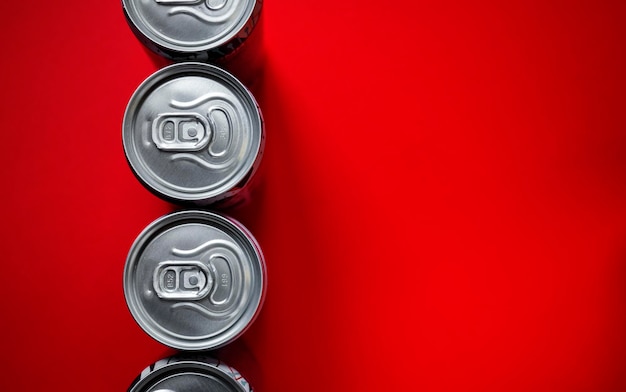 Photo high angle view of beer  can against red background