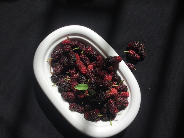 High angle view of berries in bowl