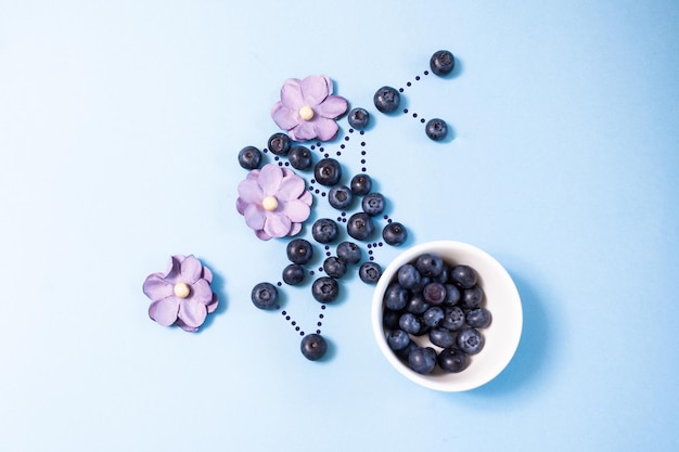 Photo high angle view of berries on table against white background