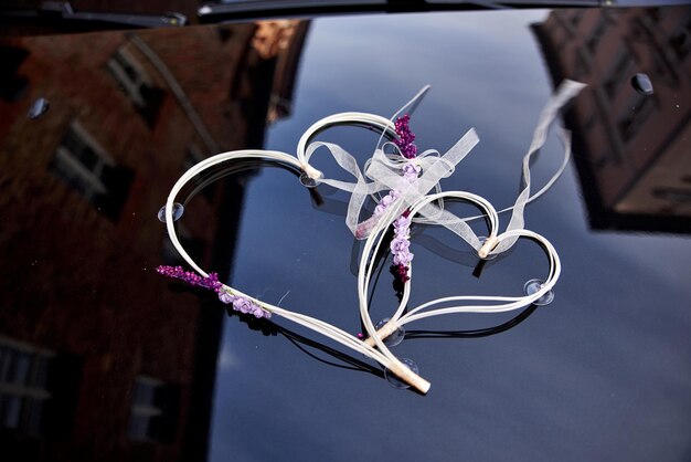 High angle view of bicycle hanging on metal