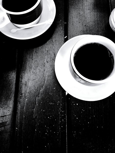 High angle view of black coffee on table