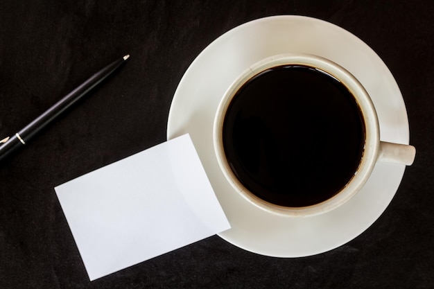 High angle view of black coffee on table