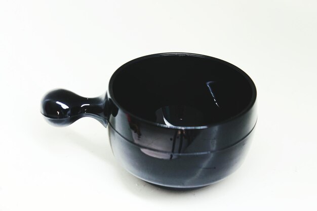 high angle view of black coffee on white background