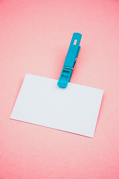 Photo high angle view of blank paper on pink background