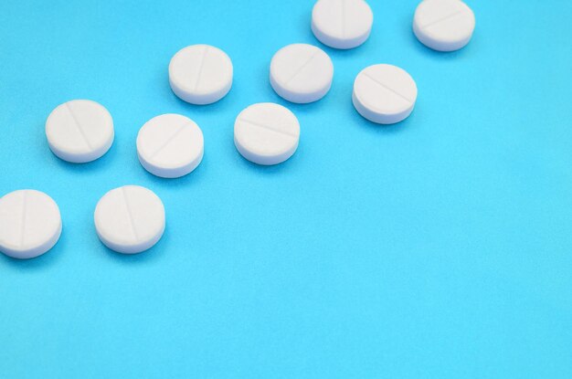 High angle view of blue buttons on table