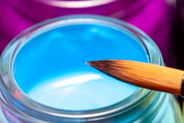 High angle view of blue glass in container