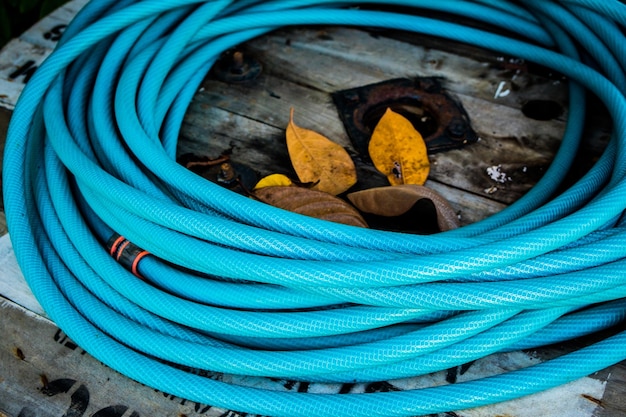 High angle view of blue pipe on table