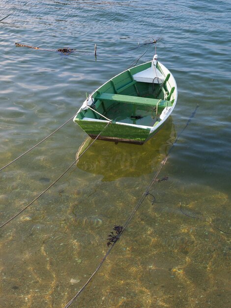 High angle view of boat floating on lake