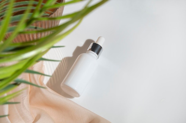 High angle view of bottle on white table