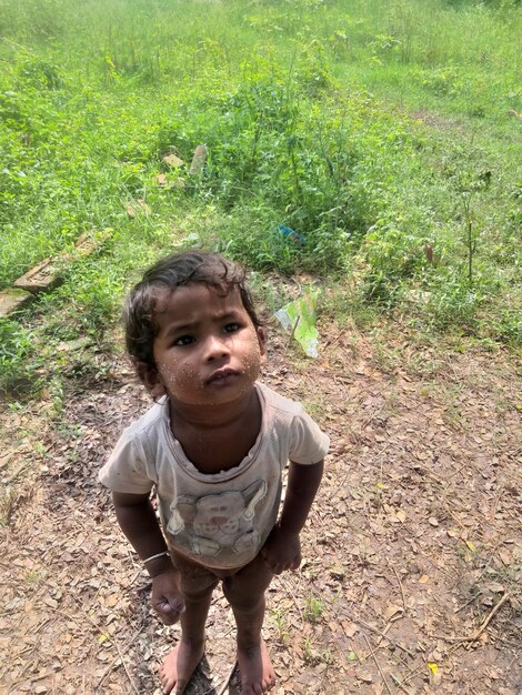 High angle view of boy standing on field