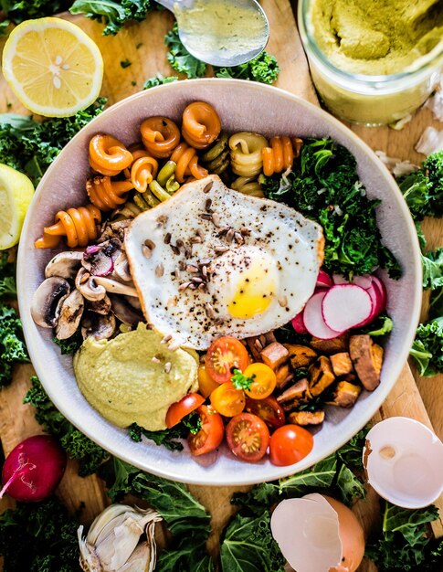 Photo high angle view of breakfast served on table