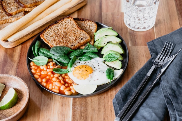 Photo high angle view of breakfast served on table