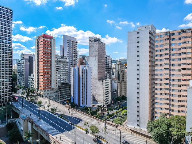 High angle view of bridge amidst buildings in city against sky