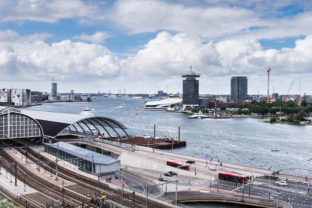 Photo high angle view of bridge amsterdam train station and harbour