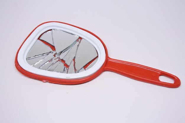 High angle view of broken bicycle on white background