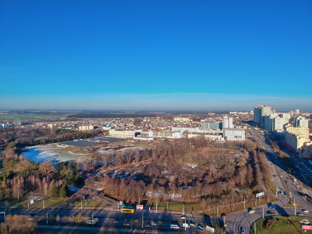 High angle view of buildings against clear blue sky