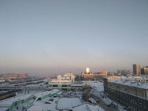 High angle view of buildings against sky during winter