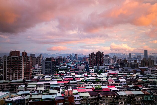 High angle view of buildings against sky during sunset