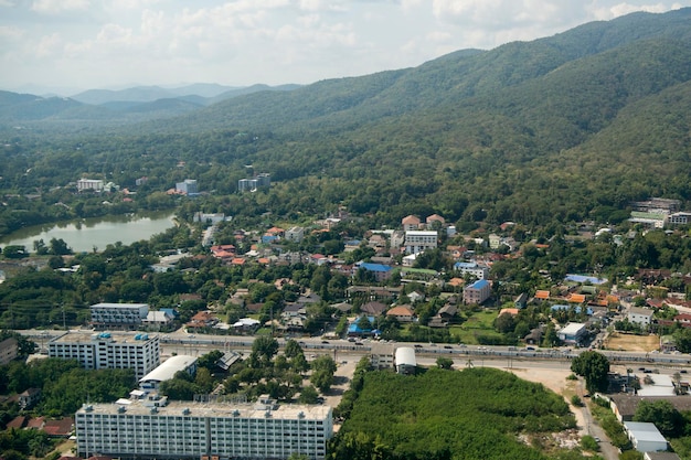 High angle view of buildings by mountain at kanchanaburi